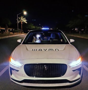 Beyond the Wheel: How AI and Machine Learning Are Driving the Future of Autonomous Vehicles Coyote stares at Waymo LIDAR, Taco Bell passenger