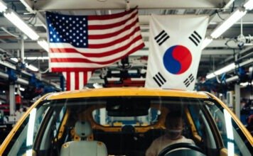 Kia’s Plans to Produce Hybrid Vehicles in the U.S. Fresh Kia hybrid with hashbrowns and flags.